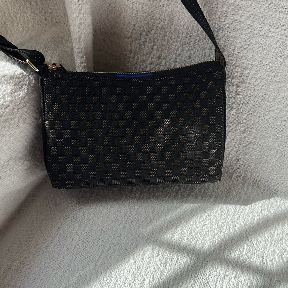 Rothy’s casual crossbody bag - Night song.